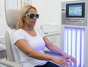 Woman Undergoing Light Therapy in a Clinic for Holistic Healthcare